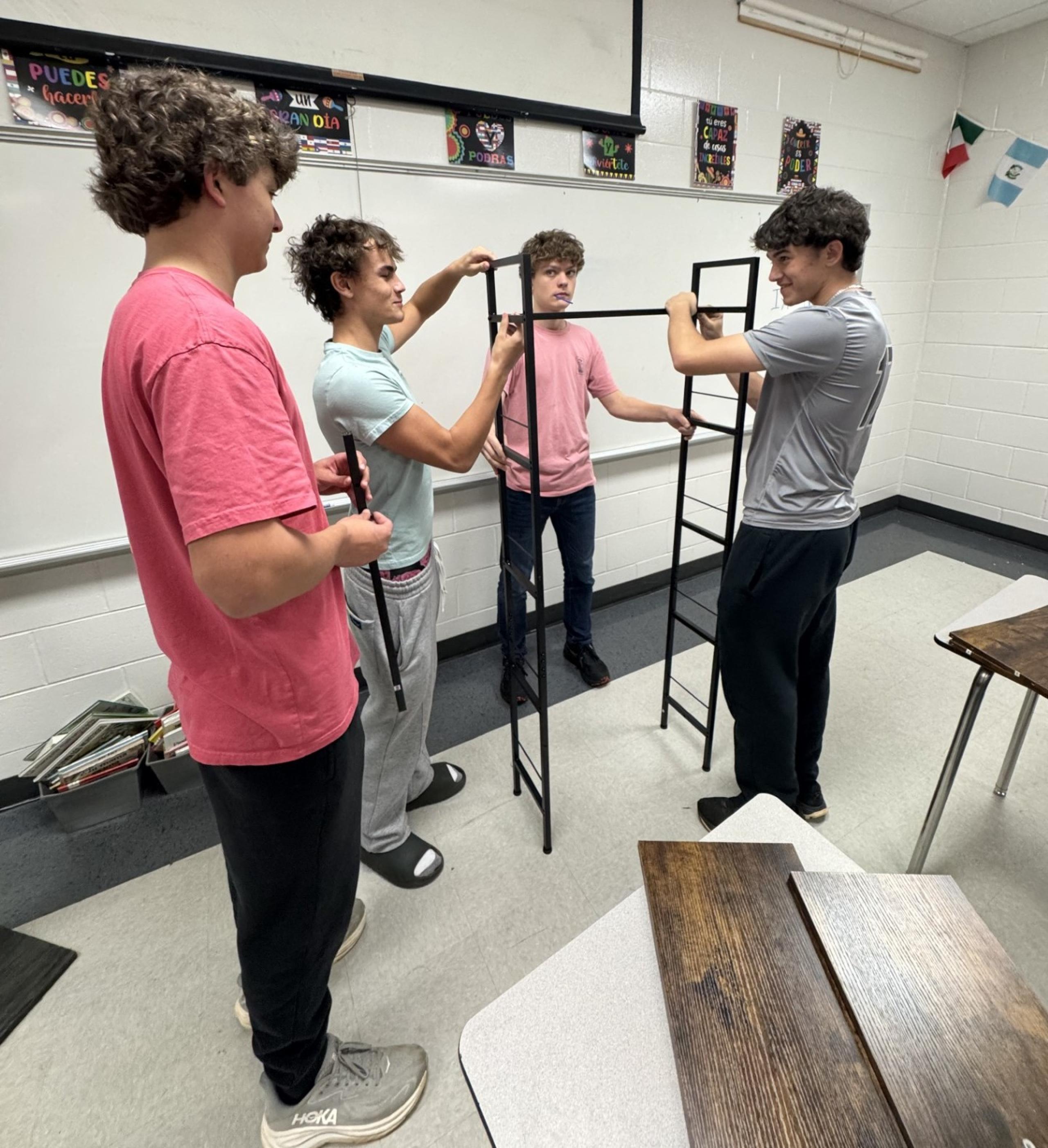 Students building shelf