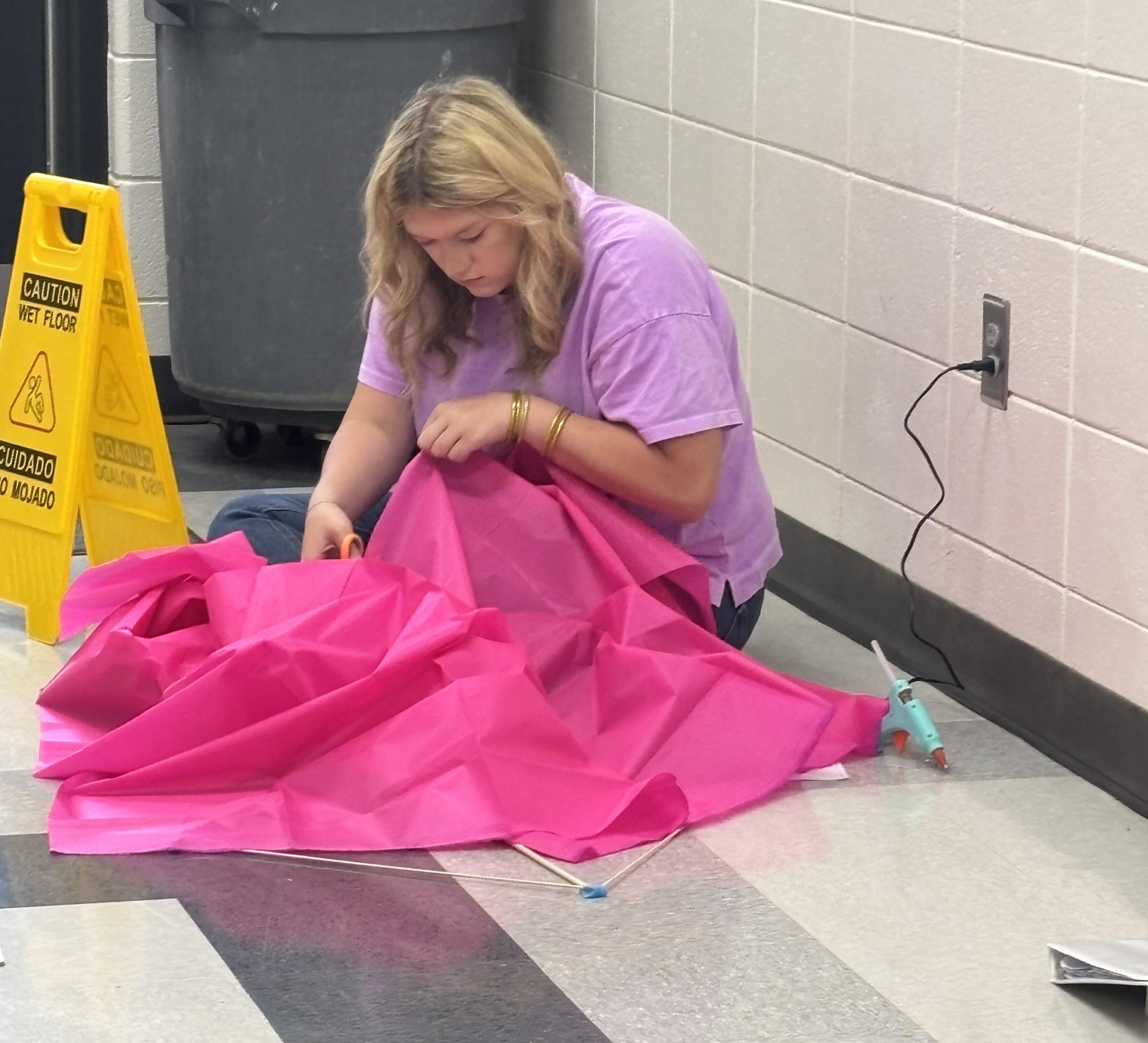 Girl making Kite